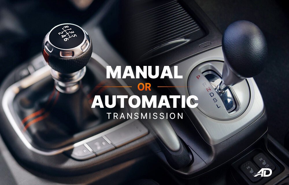 What is the role of the transmission system in a vehicle, and how does it differ between manual and automatic?