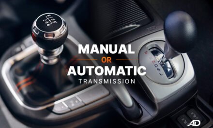 What is the role of the transmission system in a vehicle, and how does it differ between manual and automatic?