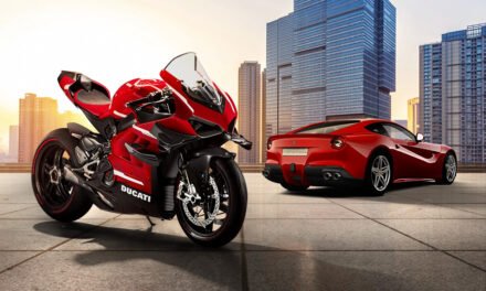 How do cars and motorcycles contribute differently to the global automotive market?