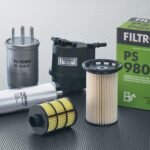 How do fuel filters prevent contaminants from entering the engine, and what types are commonly used?